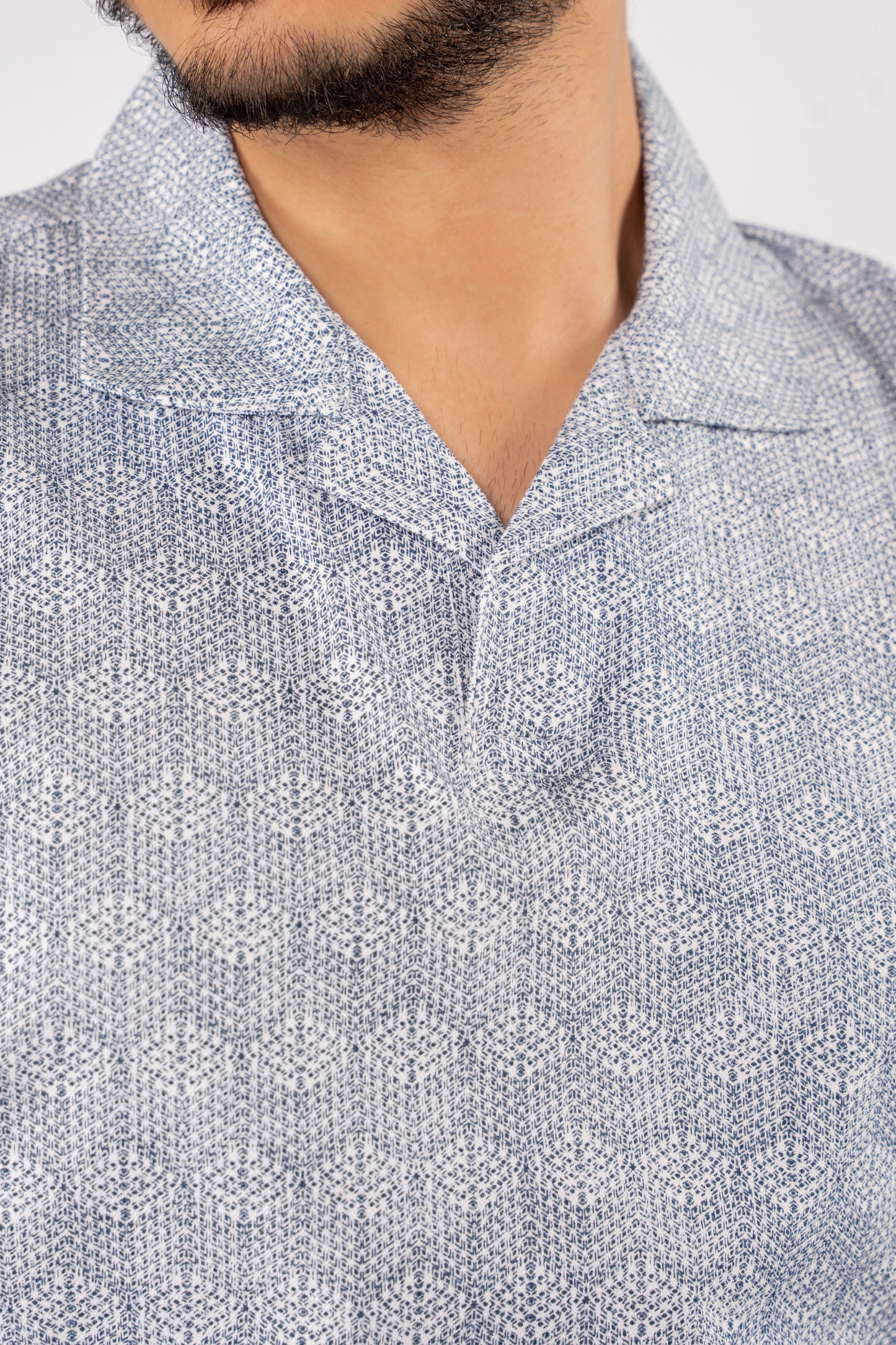 BLUE GEOMETRIC PATTERN POLO TSHIRT